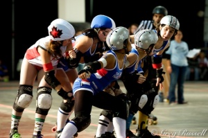 Sustained global growth of the game has separated flat track roller derby from every version that came before it. This is a Greg Russell photo of the first game played at the first ever Roller Derby World Cup (Canada vs. France).