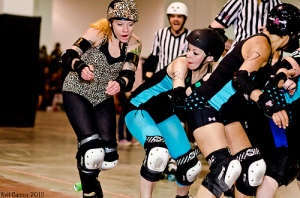 Platinum Bomb (blocking Foxy Sinatra) had a strong game in the pack for the Betties. (Photo by Neil Gunner)