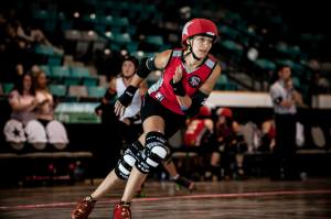 Berlin's Master Blaster was simply phenomenal, leading the tournament in scoring and track time for a jammer. She was the worthy winner of the MVP award. (Photo by Joe Mac)