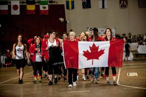 Team Canada marches during the Parade of Nations at the 2014 Roller Derby World Cup. 