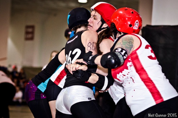 Smoke City Betties jammer WackerHer attempts to power through a Death Track Dolls wall in the ToRD semifinal. (Photo by Neil Gunner)
