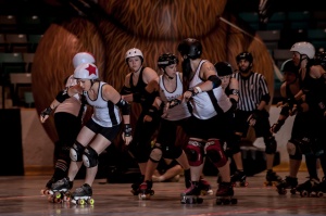 Crazy Squirrel picks up lead jammer status in a May win against Queen City. (Photo by Joe Mac)